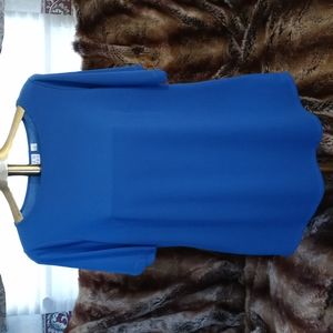 Joan Rivers large blue blouse